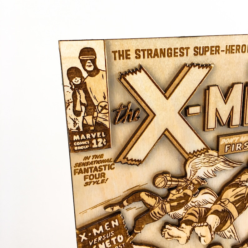 May include: A wooden cutout of a comic book cover featuring the X-Men. The cover is in a vintage style with a large "X" and the text "The Strangest Super-Hero" and "Don't Miss First Issue".