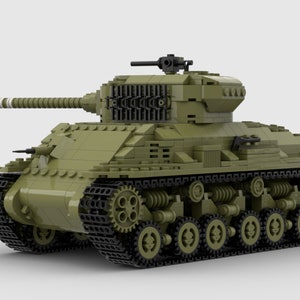 May include: A green toy tank with black tracks and a detailed design. The tank has a long barrel and a small turret on top.