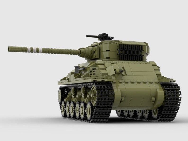 May include: A green toy tank with black tracks and a long, detailed gun barrel. The tank has a white stripe pattern on the barrel.