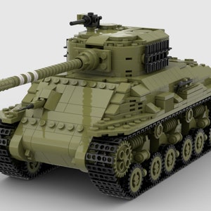 May include: A green Lego model of a tank with black tracks and a detailed gun turret.