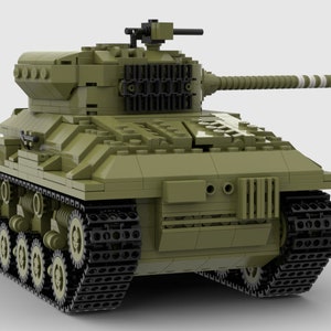 May include: A green toy tank with black tracks and a white stripe on the barrel of the gun.