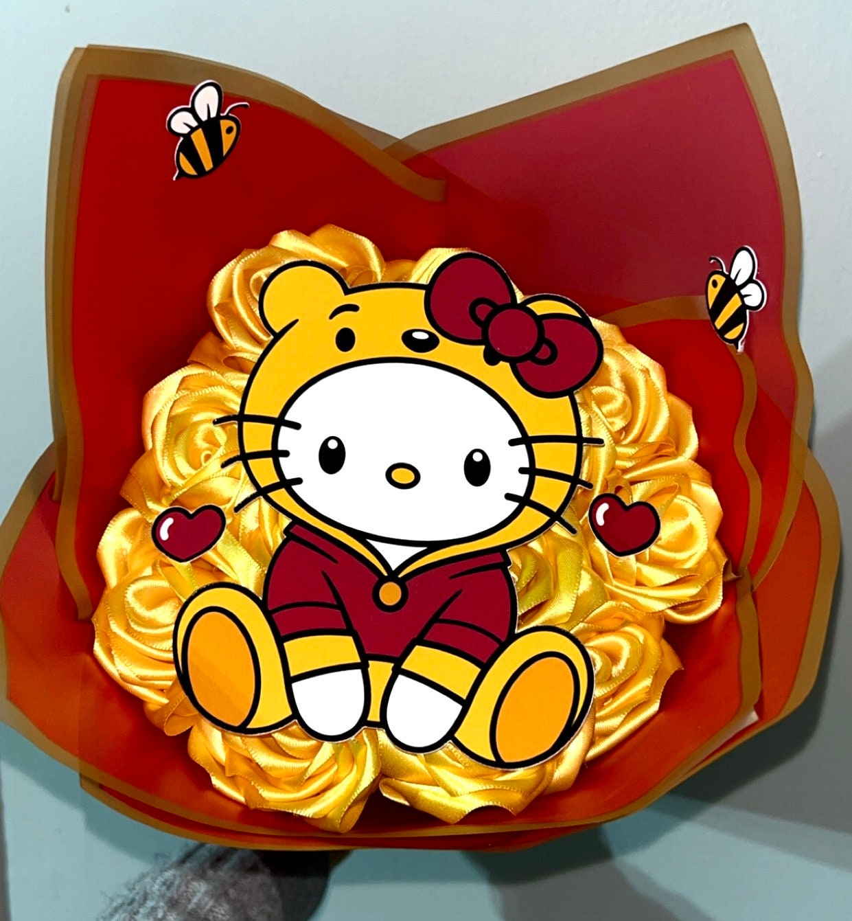 Enteral yellow flowers with hello kitty
