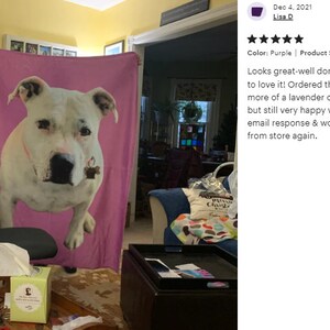 May include: A personalized purple blanket featuring a large image of a white dog with brown markings. The blanket is rectangular, approximately 50 x 60 inches, and is displayed indoors.