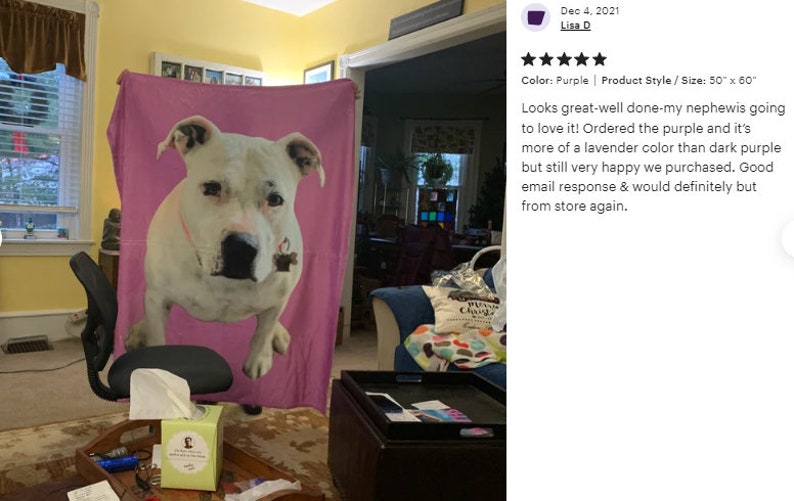 May include: A personalized purple blanket featuring a large image of a white dog with brown markings. The blanket is rectangular, approximately 50 x 60 inches, and is displayed indoors.