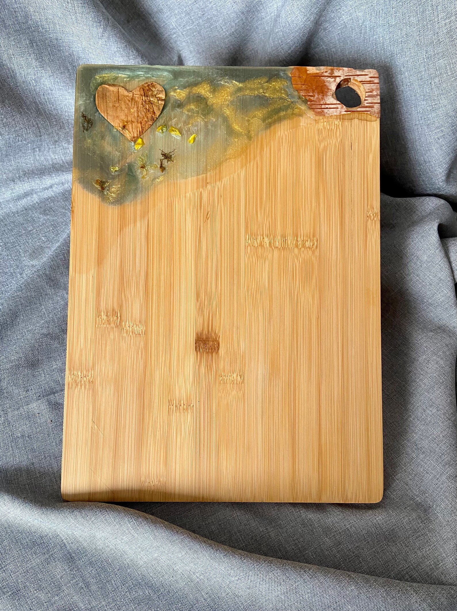 Bamboo cutting board and epoxy resin with dried flowers and Etsy