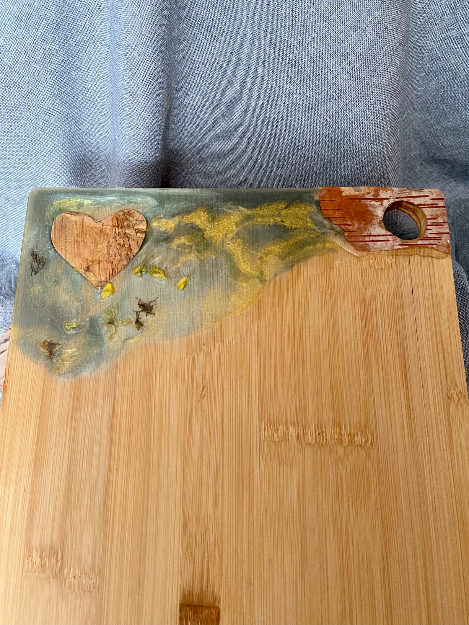 Bamboo cutting board and epoxy resin with dried flowers and Etsy