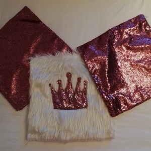 A set of plush cushion covers designed by a shiny sequin crown and two shiny sequin cushion covers.  Pillow Covers.  Love. Gift. Crown.