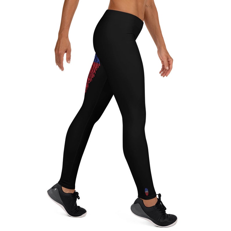 May include: Black leggings with a red, white and blue graphic print on the left leg. The leggings have a small logo on the right leg.