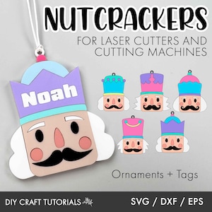 May include: A set of six nutcracker ornaments and tags for laser cutting. The ornaments are in various colors, including pink, blue, and purple. The tags are blank and can be personalized with names. The ornaments feature a traditional nutcracker design with a hat, mustache, and beard.