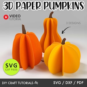 May include: Three 3D paper pumpkin designs, including a traditional round pumpkin, a tall, slender pumpkin, and a round pumpkin with a slightly flattened top. The pumpkins are orange and have a textured paper look. The image includes the text "3D Paper Pumpkins", "Video Tutorial", "SVG Cut Files", "3 Designs", and "DIY Craft Tutorials".