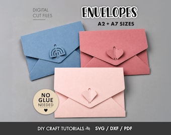 May include: Three paper envelopes in blue, dusty rose, and light pink, featuring A2 and A7 sizes. The blue envelope has a rainbow closure, while the rose and pink envelopes have heart closures. Text includes ENVELOPES, A2 + A7 SIZES, NO GLUE NEEDED, and DIY CRAFT TUTORIALS SVG / DXF / PDF.