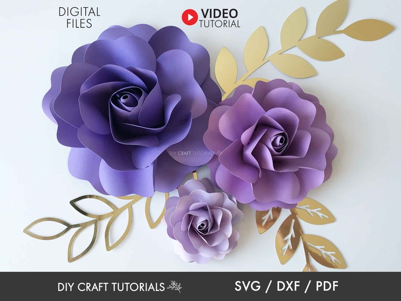 Puede incluir: Flores de papel moradas con ramas de hojas doradas. Tutoriales de manualidades. Archivos digitales SVG, DXF, PDF.