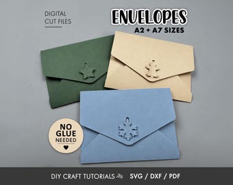 May include: Three paper envelopes in dark green, tan, and light blue, each featuring a die-cut closure in the shape of a star, gingerbread person, or snowflake. Text reads: DIGITAL CUT FILES, ENVELOPES A2 + A7 SIZES, NO GLUE NEEDED, DIY CRAFT TUTORIALS, SVG / DXF / PDF.