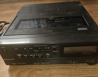Grabadora de vídeo portátil VHS Panasonic VN-180E (modelo antiguo)