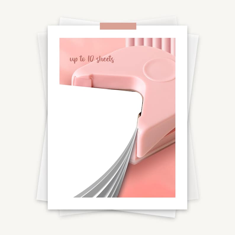 K&ouml;nnte beinhalten: Ein rosa Papier-Schneideger&auml;t mit einem Stapel wei&szlig;en Papiers, der geschnitten wird. Der Schneideger&auml;t hat einen Griff und eine Basis. Der Text "bis zu 10 Bl&auml;tter" ist auf dem Schneideger&auml;t sichtbar.