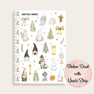 May include: A sticker sheet featuring watercolor illustrations of Christmas gnomes, trees, bows, and candles. The text "Christmas Gnomes" is at the top. The sheet includes a washi strip and is decorated with gold accents.