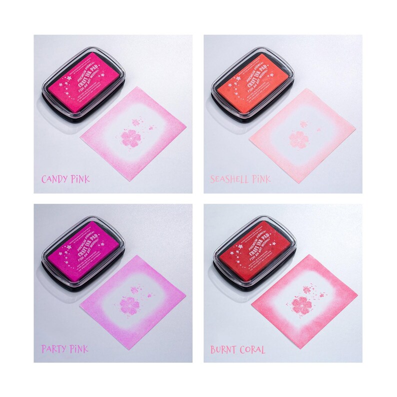 May include: Four ink pads in different shades of pink and coral. The ink pads are labeled "Craft Ink Pad" and have a floral design. The colors are Candy Pink, Seashell Pink, Party Pink, and Burnt Coral.