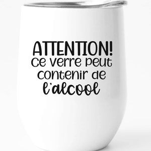 Attention! Ce verre peut contenir de l'alcool