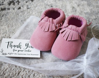 pink baby moccasins