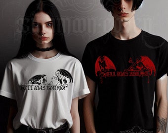 May include: Two people wearing black and white t-shirts with a graphic of two demons and the text "Hell was boring".