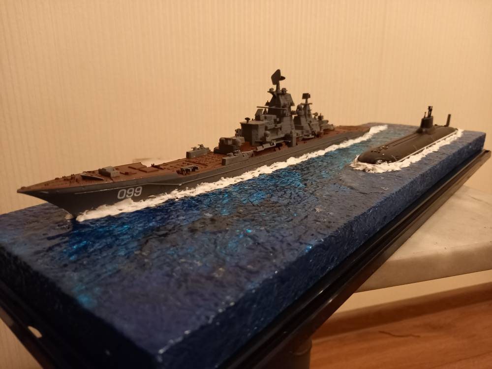 Soviet-Russian nuclear-powered guided missile battle cruiser Kirov class and Typhoon class submarine with diorama