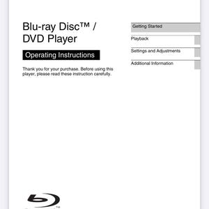 May include: A white instruction manual for a Sony Blu-ray Disc/DVD player. The manual includes the Sony logo, the words "Blu-ray Disc/DVD Player" and "Operating Instructions". The manual also includes the Blu-ray Disc logo and model numbers.
