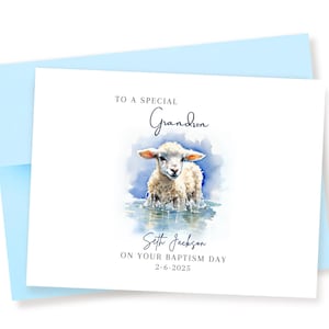 May include: A white card with blue text that reads "To a special Grandson Seth Jackson on your Baptism Day 2-6-2025". The card features a watercolor illustration of a white lamb standing in a blue pool of water.