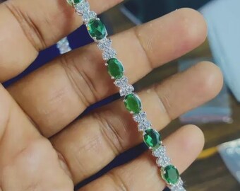 Emerald Tennis Bracelet: Oval Cut Simulated Green Diamond, 14K White Gold Finish, Sterling Silver