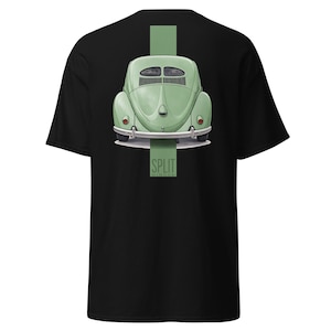 May include: Black t-shirt with a green illustration of a classic car's rear. A vertical green stripe runs down the centre, with the text "SPLIT WINDOW" in a green rectangle. The car is light green and has a rounded shape.