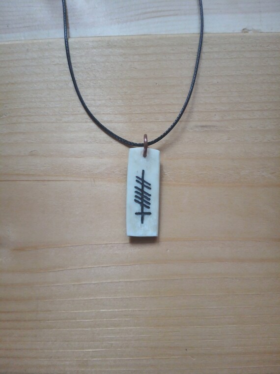 Antler Pendant With Ogham, 