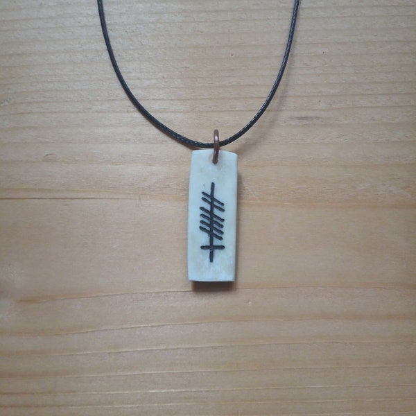 antler pendant with ogham, "Gra" (love in gaelic)