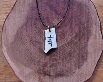 Antler pendant with Ogham "Adh" (Luck in Gaelic)