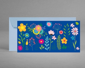 Puede incluir: Una tarjeta azul con un patrón floral colorido. Las flores son rosas, amarillas, naranjas, azules y verdes. La tarjeta es perfecta para enviar un mensaje especial.