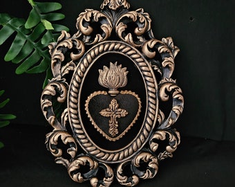 Framed black velvet sacred heart with gold colour flame and cross, gothic art. In a burnished gold ornate, hand cast frame.