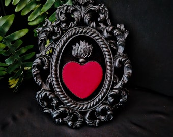 Framed red velvet sacred heart with black flame, gothic art. In a black ornate, hand cast frame.
