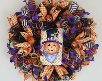 Couronne de citrouille d’Halloween pour porte d’entrée, décor à thème effrayant, cintre de porte Jack-o-Lantern d’automne