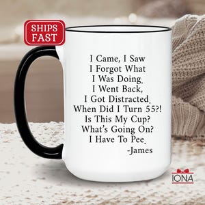 May include: White ceramic coffee mug with a black handle and rim. The mug features humorous text: "I Came, I Saw, I Forgot What I Was Doing..." and the name "James." A red and white "SHIPS FAST" sticker is visible.