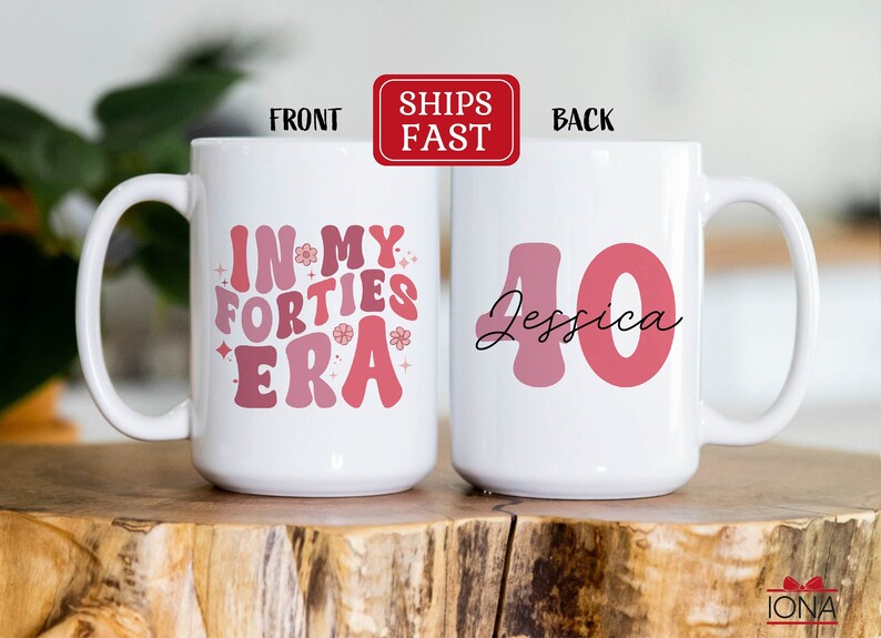 May include: White ceramic mug with the text "IN MY FORTIES ERA" in pink and red retro font on the front. The back of the mug features the number "40" and the name "Jessica" in a script font.