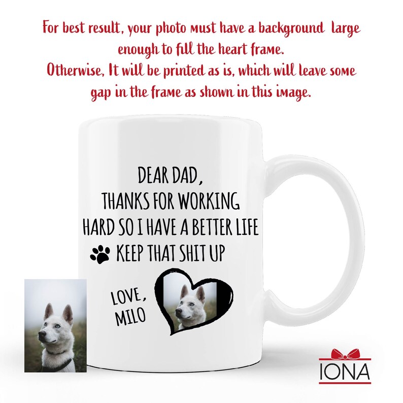 May include: White ceramic coffee mug with a black paw print and the text "Dear Dad, Thanks for working hard so I have a better life. Keep that shit up. Love, Milo". A white dog with blue eyes is pictured in a black heart shape.