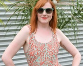 Swimsuit with Teal and Red Abstract Pattern