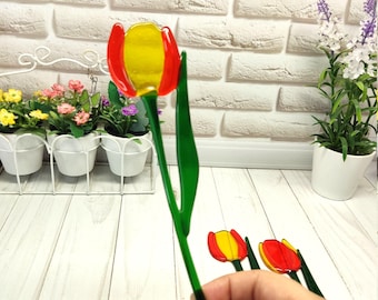 Fusing tulip, stained glass tulip flower on the stem, plant suncatcher