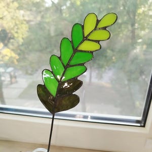 Stained glass fern leaves, green branch, plant stake, suncatcher panel leaves