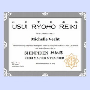 May include: A certificate with a gray border and decorative corner designs. The certificate is for Michelle Vecht, a Reiki Master & Teacher, awarded September 11, 2019. The certificate includes Japanese characters and the words "USUI RYOHO REIKI".