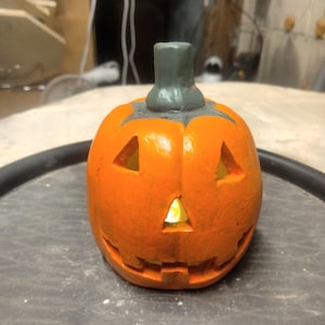 Ceramic Jack O&#39; Lantern With LED Flickering Tea Light
