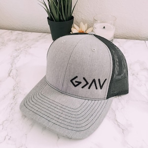 God is greater than the highs and lows embroidered grey mesh back hat