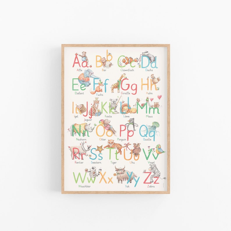 May include: A colorful alphabet chart featuring animals and their names in German. The chart is framed in wood and has a white background. The letters are in a variety of colors and fonts, and the animals are illustrated in a cartoon style.