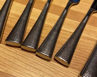 Scandina cutlery 17 piece set. Scandinavian quality. Heavy stainless pieces mid century Eames classy