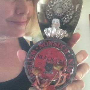 Lady in Black(cat) is an art assemblage of authentic old recycled things.