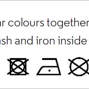 May include: Washing instructions for a garment: machine wash cold, do not bleach, tumble dry low, iron low, do not dry clean. Wash similar colors together, do not iron on print, wash and iron inside out.