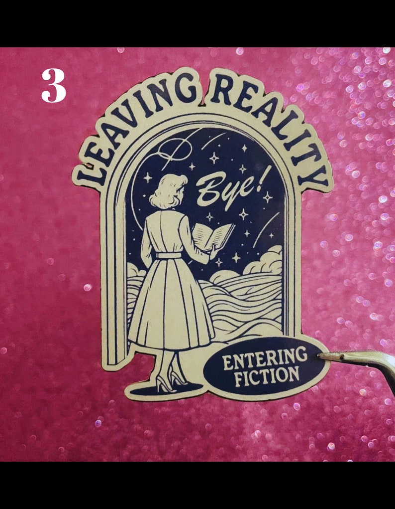May include: A sticker with a retro illustration of a woman walking through a doorway labeled "Leaving Reality" and entering a doorway labeled "Entering Fiction". The woman is holding a book and looking up at the stars. The sticker is on a pink background.